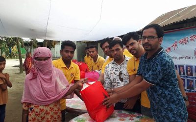 আখাউড়ায় প্রবাসীদের অর্থায়নে ইফতার সামগ্রী বিতরণ।